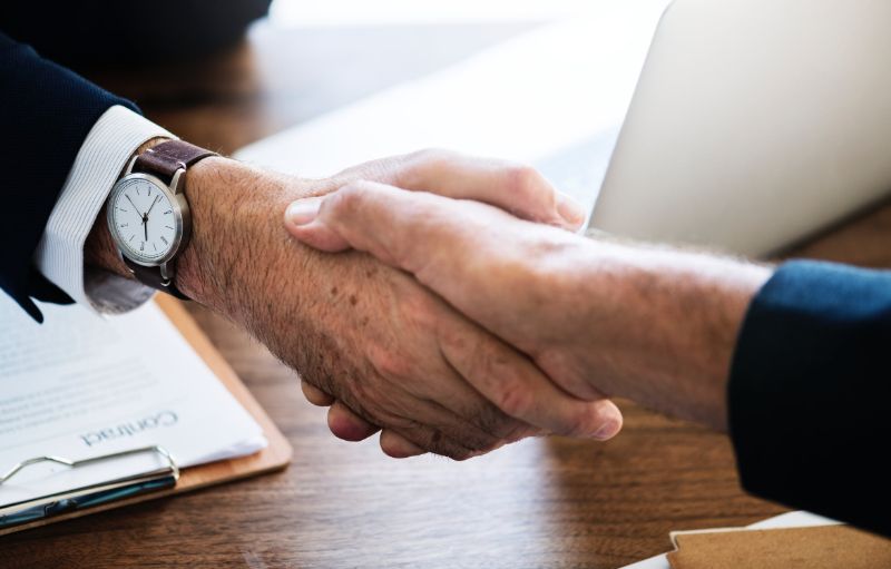 Handshake Over Completed Deal